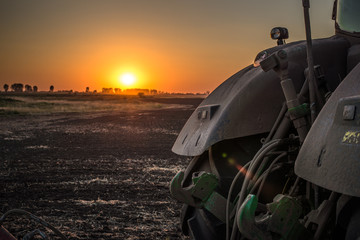 Tractor at sunset