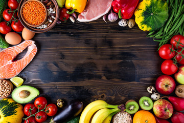 Background healthy food. Fresh vegetables, fruits, meat and fish on wooden table. Healthy food,...