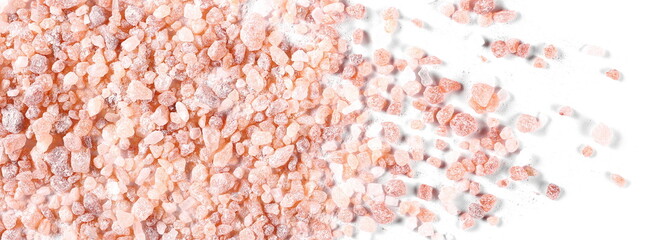 Himalayan salt grains isolated on white background, top view