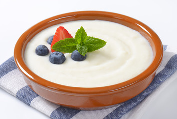 bowl of semolina pudding with fruit