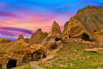 beautiful sunset with clouds cave town in Goreme, Cappadocia, Turkey