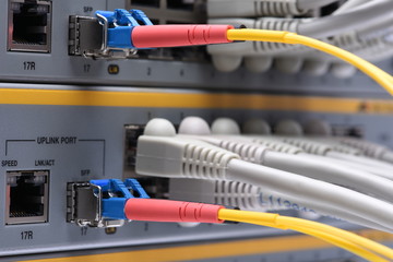 Ethernet network and fiber optic cable connected to internet switch, cyber security in data center system
