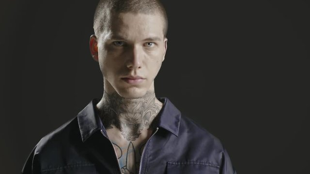 Handsome confident, successful stylish man portrait - neck tattoo - male fashion model - Prores