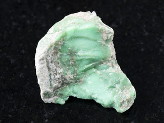 raw Variscite stone on dark background