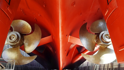 propeller and ship stern at dry dock - obrazy, fototapety, plakaty