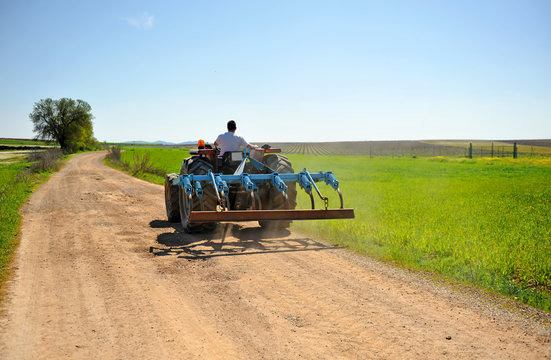 Agricultural tractor in the field