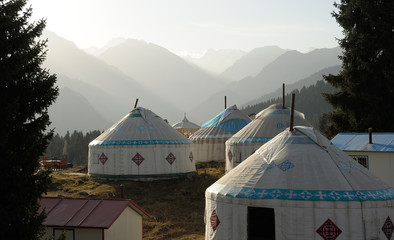 Yurts in front of Tianshan lake Xinjiang, China