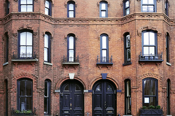 Fototapeta premium Old red brick house in Brooklyn