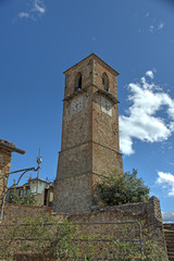 Ancient historic clock and belltower, Anghieri, Tuscany, Italy