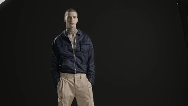 Handsome stylish fashion model - neck tattoo - male fashion model - Fashion shot