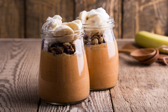 Pumpkin smoothie with granola and bananas