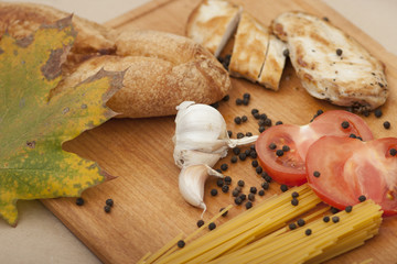 appetizing bun with spices and tomato