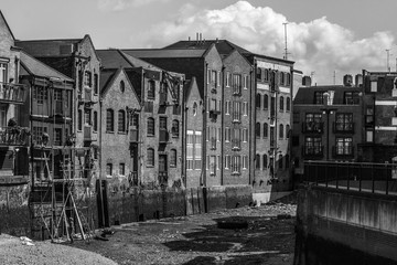 black and white photograph of docklands buildings in London