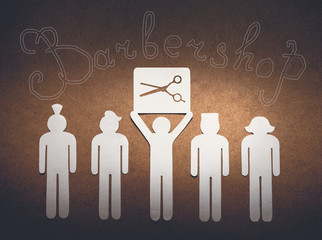 Barbershop concept. Cut out of white paper little men illustrate the skill of the hairdresser to model different haircuts.