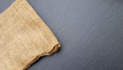 Burlap sack on dark background