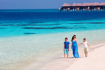 Mother and kids at tropical beach