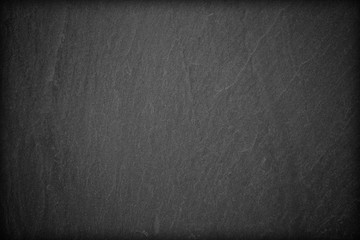 Dark grey black slate background or texture.