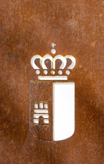 castilla la mancha flag on a rusty metal plate