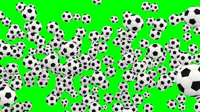 Animated a lot of simple soccer balls with white and black material dancing, flying or jumping against green background and in slow motion. Front camera view.