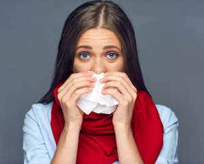 Allergies or flu sickness woman holding paper tissue