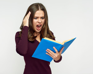 Shocked surprised woman holding book.