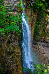 Plakat Photo of high waterfall in Carpathian mountains