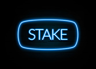 Stake  - colorful Neon Sign on brickwall