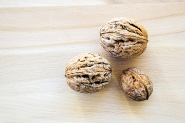Walnut isolated on a wooden background