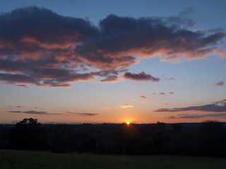 beautiful country scene fields trees horizon sky red autumn sun set Dedham Vale