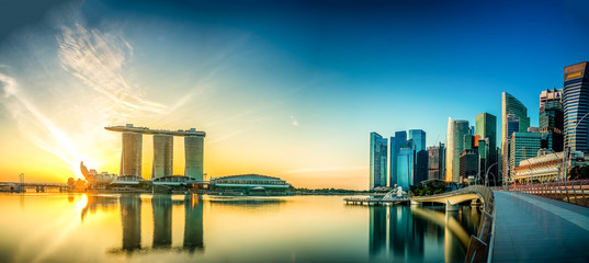 Beautiful sunrise at Marina Bay with a panoramic view of the Marina Bay Sands hotel and the skyline...