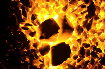 
Kindling coal anthracite of coarse and fine fractions, as a background.