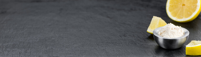 Ground lemon on a vintage looking slate slab (selective focus)