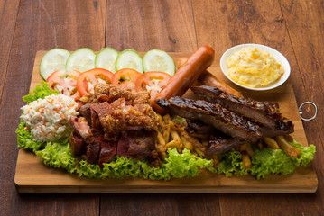 roasted pork knuckle ribs ,sausage and mash potatoes