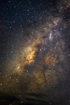 Center of the milky way galaxy with cloud. Stars and space dust in the universe. Closed up image with long exposure.