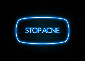 Stop Acne  - colorful Neon Sign on brickwall