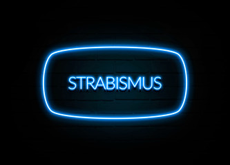 Strabismus  - colorful Neon Sign on brickwall