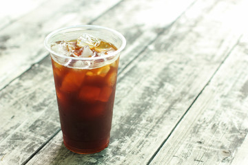 Iced coffee black coffee on wood table