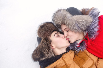 Loving couple of teenagers. Winter