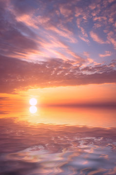 A photograph of a sunset over the sea for wallpaper on the computer desktop.