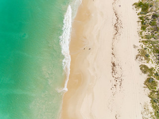 Fototapeta na wymiar Aerial Of Sandy Beach In Summer