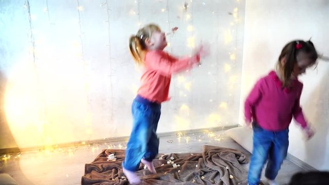 Two Kids Dancing At Home Christmas Party