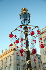 Fototapeta na wymiar Christmas decoration of street lantern in Nancy, France