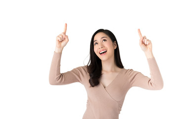 Beautiful Asian woman pointing her hands up and looking above her head