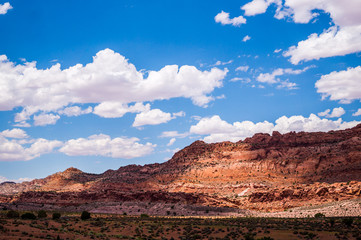 Fototapeta na wymiar Picturesque red rocks and sky. Navajo Territory in Arizona