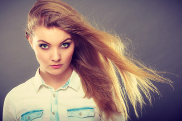Attractive blonde woman with windblown hair