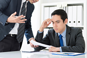 Businessmen discussing work ideas and brainstorming