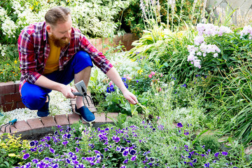 Happy man gardening