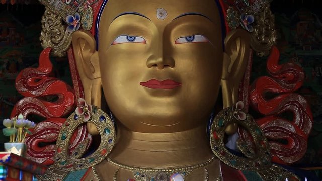 Close up colorful sculpture of Maitreya buddha at Thiksey Monastery, Tibetan Buddhist monastery in Ladakh, India