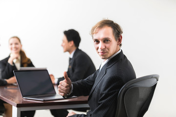 Businessman in meeting room.