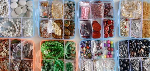 colorful beads in boxes